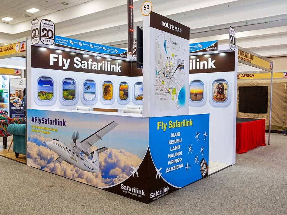 Fly Safarilink exhibition stand showing the route map across Kenya and Tanzania
